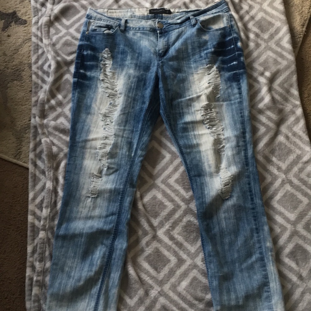 Ripped acid wash jeans